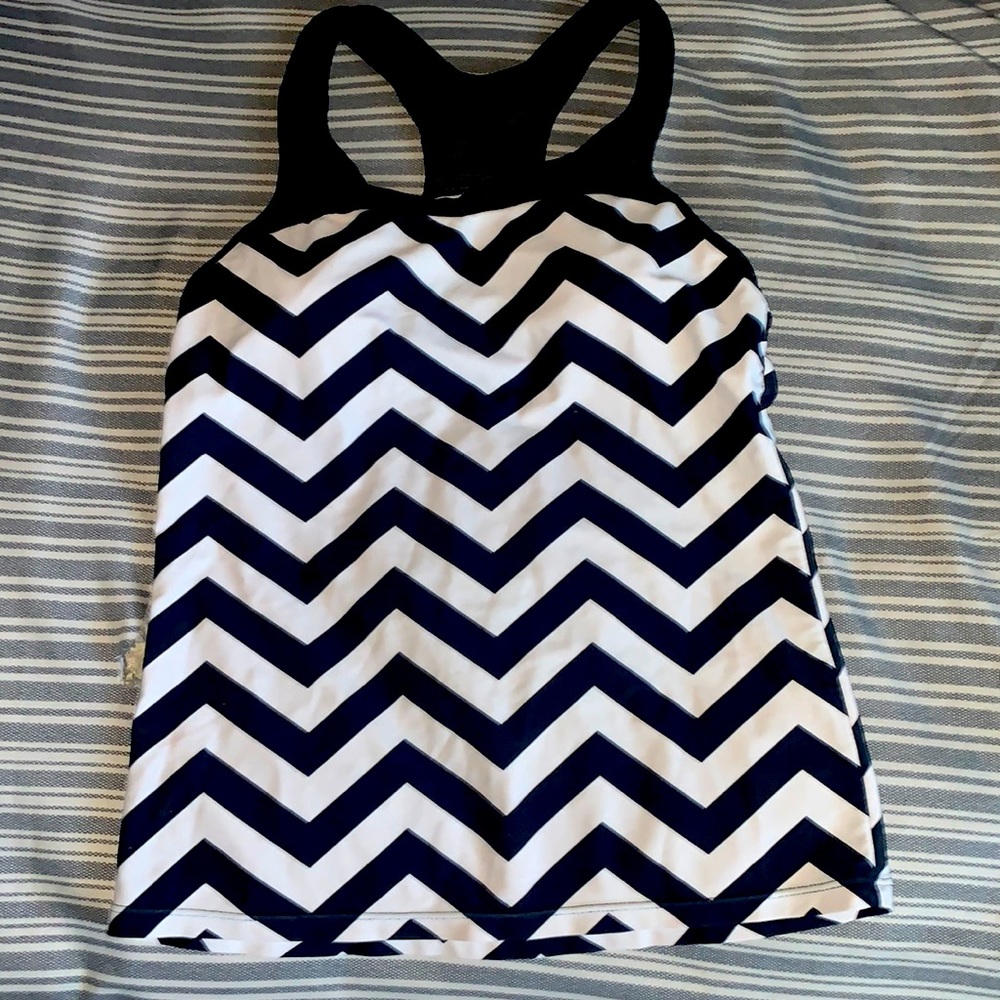 Two piece swim suit brand is Tahiti size is medium